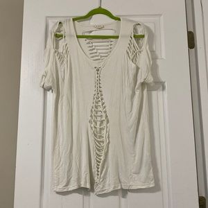 White completely cut shirt